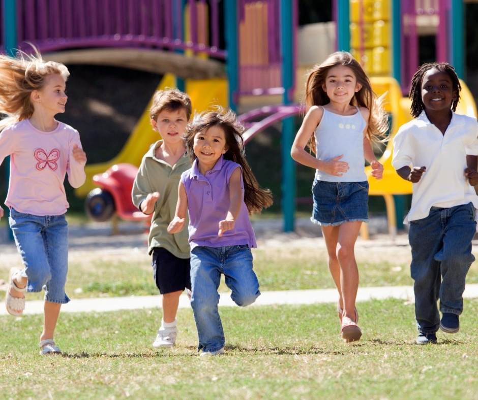 kids running through a park